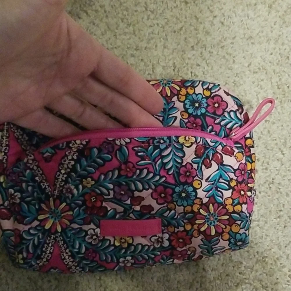 Pink Vera Bradley makeup bag.